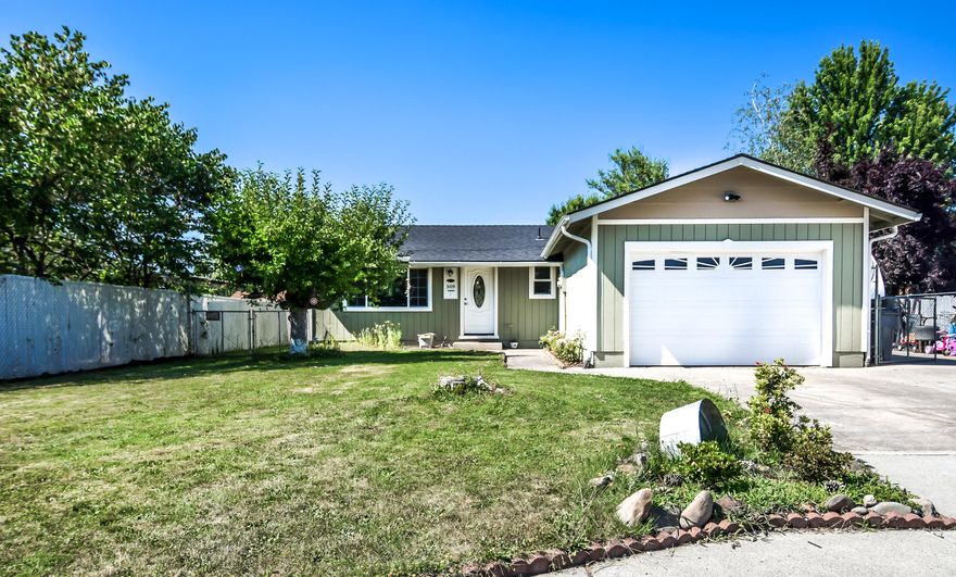 Super Cute, remodeled 3 bedroom 2 bath home in a great neighborhood!! Home is open and bright, with bamboo floors, remodeled bathrooms with new tile surround in the master bath and new cabinets and flooring in the second bath. Pride of ownership is everywhere with the well maintained yards and fresh paint. In addition to the attached garage the home also has a detached shop with oversized doors to allow for toys or projects! This home also has huge Rv parking that is both paved and gated!! If you're looking for a home with everything and at a great price point, you have found it!!