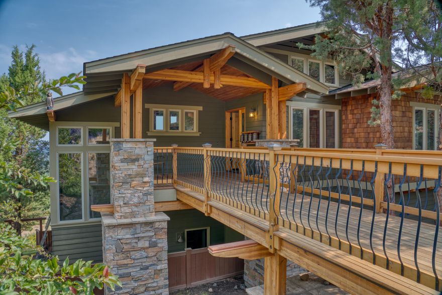 Enjoy this wonderful 4 bedroom home with inviting sunrises and sunsets. Located on the slopes of Awbrey Butte it features an open plan, separate office, ginormous family room with a wet bar. Tons of storage, additional closets and even an extra pantry. The deck runs the entire width of the home for lovely evening dinners and social distancing. Plumbed for for an elevator, hot tub and central vac, too Solar panels feed electricity back to the grid and four car garage and additional shop with an almost flat driveway off the alley access are impressive. Seller in process of painting.