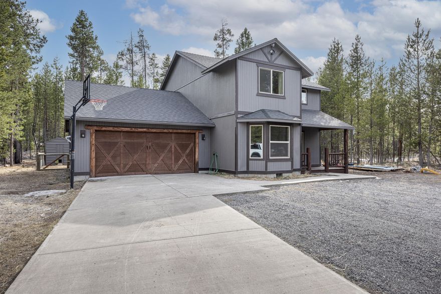 Custom home built by a master builder in 2007 on .49 acres. Real wood features such as open rails, built in book shelf, wood floors, and log accents.4 bed, 2.5 bath. Kitchen pantry and recently updated appliances. Secret door attic access through master. Catalytic EPA rated wood stove. Storage room off garage with extensive shelving. Spa, fenced back yard, treed back property. 2 car garage with plenty of added shelving.  Concrete driveway/sidewalk. 200ft2 covered storage on the side of the house. Private HOA access to Deshutes River dock and boat launch only seconds away. Annual Neighborhood fee is $275.