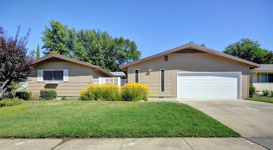 This newly updated home is located in a great neighborhood and close to all amenities. This 3 bedroom 2 bath home offers 1894 square feet of living space, a large open family room with brand new hard wood flooring, large dining area, open kitchen with BRAND NEW stainless steel Whirl Pool appliances including the refrigerator, dishwasher and built in stove with an additional 3 year warranty through Lowes, a nice large in-door laundry room, and a two car garage. Home also has had new hardware placed in the kitchen and bathroom, new stainless steel kitchen sink faucet, new energy star light fixtures in all 3 bedrooms, new modern door nobs, new light fixtures in main bathroom, new carpet, new interior paint (2014), Brand new exterior paint, Free standing remote control gas fireplace, Newer water heater (2013), Newer heater (2010), and a newly redone swimming pool to enjoy on those hot days! This home sits on a .21 acre lot and has a lot of room for entertaining. The lovely tile patio is co