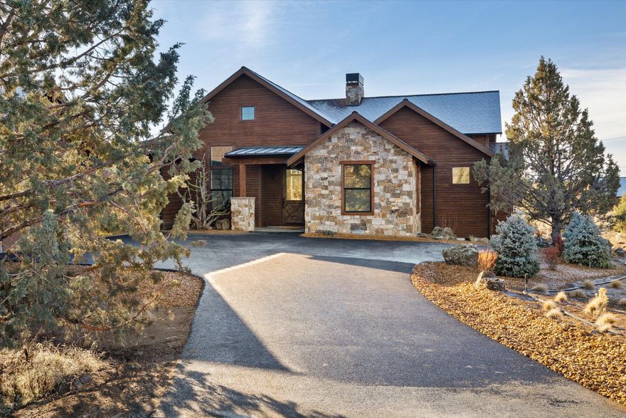 Welcoming New Construction one-level NW style home accentuated with stone accents and stained wood siding on the exterior. This home is well situated on the Westside at Brasada Ranch and features dramatic Cascade Mountain views from the rear of the home and outdoor living area. As you enter the home you will find sunlight fills the great room through the expansive windows. High ceilings lend space for the stone fireplace surrounded by exquisitely crafted built-ins. The kitchen features stainless steel appliances and a large walk-in pantry. Slab countertops and island are perfect for the home chef. Beautiful hardwood flooring throughout the living areas. The primary suite is situated on one side of the home offering a peaceful oasis with a large walk-in closet and oversized soaking tub. This home offers a den/office space, two additional bedrooms and roomy garage.