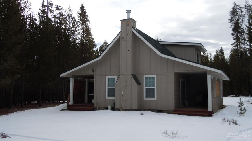 Don't miss out on this like new 2 bedroom cabin located on extremely private 5 acre parcel that backs up to forestland. One bedroom in the loft area and 1 bedroom downstairs. Extremely well built with covered front and back decks. Wildlife galore! Easy access to numerous trails and hunting right from your own back yard!! This would make a great vacation get away or full time living!!!