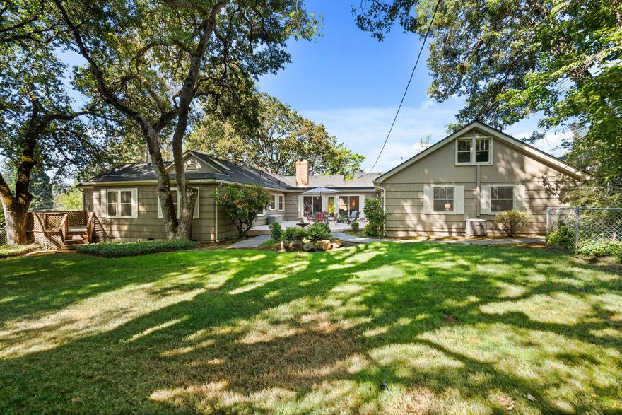 Rare Multi Generation Golf Course Property

Opportunities abound with this quality mid-century home with city approval for a lot split. The existing home has  is a 6 bedroom home with two separate wings, 3.5 baths, 3112  sq. ft.,2 fireplaces, living and family rooms, skylights, large patio, all on 1 level. A small basement will work for a wine cellar. Large oaks provide a shade covered canopy for the .77 acre lot. The City of Medford has approved splitting the lot to create a separate 70' X 180'. This property fronts on a quiet portion of the Rogue Valley County Club near the putting green.