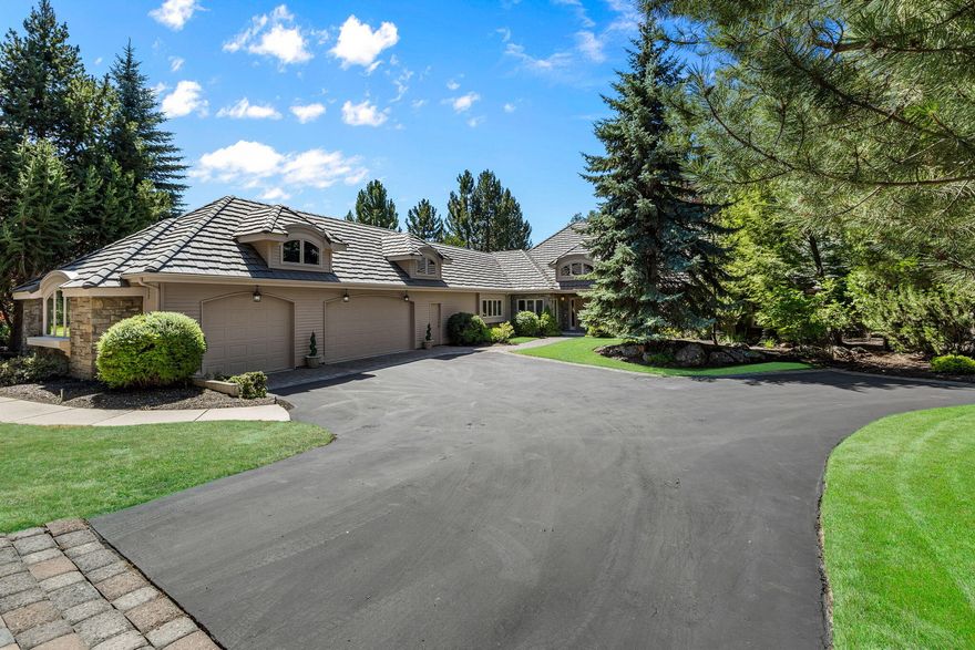 Picturesque lake and 17th-fairway views from this beautifully remodeled single-level Broken Top home, set on a mature landscaped lot with front and back water features adding to the peaceful ambiance. Interiors intertwine luxury with comfortable living spaces, where the spacious living area's wall of windows showcases the outdoors and custom built-ins add warmth. A cheerful breakfast nook adjoins the gourmet kitchen with 2 Wolf ovens, Fisher & Paykel dishwasher, island with gas cooktop, wine fridge & breakfast bar; an elegant dining room sits nearby. The floorplan provides an ideal separation of space, offering an office large enough to double as a den, complete with cozy fireplace. The primary suite, with its own private golf-course-view patio, includes a luxurious remodeled bath & walk-in closet. On the opposite end of the home, the guest wing features two bedroom suites with adjoining sitting area. Expansive laundry room & large 3-car garage complete this remarkable home.