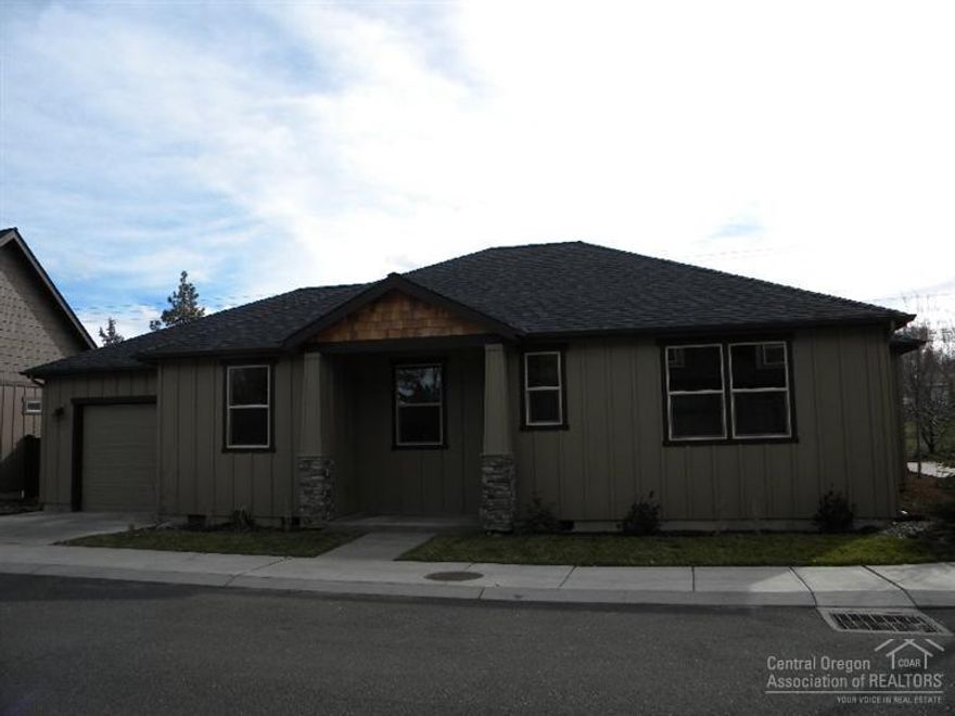 Now complete single story; it's adorable! Beautiful and functional finishes include, Knotty Alder custom cabinetry & trim, S/S appliances, hand textured walls, blown-in insulation, high efficiency gas furnace & hot water heater, laminate flooring throughout the main living areas and much more! Pull-thru garage (doors at each end) for ease of parking a trailer behind the fence and a nice size backyard. This home has an open light and bright floor plan!
