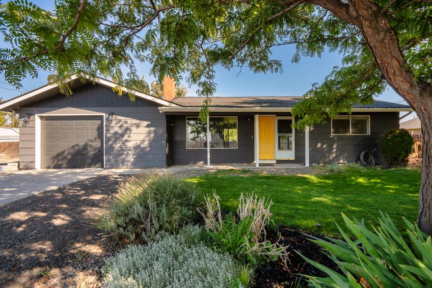 Seller offering a $5,000 credit on this charming and updated 2-bedroom, 1-bath single-story home, featuring a new 2025 roof, central heating and cooling, and a tankless water heater for year-round comfort. This 1,136 sq ft stick-built home sits on a well-maintained .16-acre lot and blends modern upgrades with classic charm. Enjoy an updated kitchen with butcher block/epoxy countertops, stainless appliances, and a cozy dining area. New laminate flooring flows throughout, and the wood-burning fireplace adds warmth on cool evenings. The oversized mud/laundry room offers excellent storage and flexibility. Outside, you'll find RV parking, landscaped front and back yards, and a fully fenced backyard perfect for pets, gardening, or entertaining. The attached single-car garage includes a workbench and extra space. Move-in-ready and thoughtfully improved, this home delivers comfort, efficiency, and inviting style.