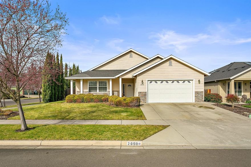 Single level, one-owner home located in a great neighborhood. Vaulted great room is very spacious and features a cozy gas fireplace and picture window. Open and inviting kitchen is also vaulted, has a newer refrigerator and eat-in breakfast bar. There is beautiful hardwood flooring in the entry, dining and kitchen. This well maintained home is situated on a choice corner lot with an inviting front porch to take in the surrounding mountain views. Plenty of storage and natural light throughout. All three bedrooms are very roomy. The master suite offers dual sinks in the bathroom, a deep soaking tub, walk-in closet plus french door access to the over-sized covered back patio. Interior laundry room with utility sink. Attached two car garage plus plenty of outdoor place in the yard.