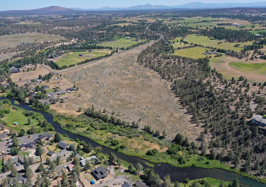 Don't miss this rare opportunity to own 42+/- acres of land in unincorporated Tumalo, Oregon. This one-of-a-kind property is currently zoned TUR5 with development potential and features gorgeous mountain views. An additional 38+/- acre parcel that includes approximately 3,000 feet of Deschutes River frontage is also available for purchase (see MLS#220168565). Seller has an engineered drawing for a potential development plan. Additional maps and pertinent land use documents are available. Buyer(s) to do their own due diligence with Deschutes County.