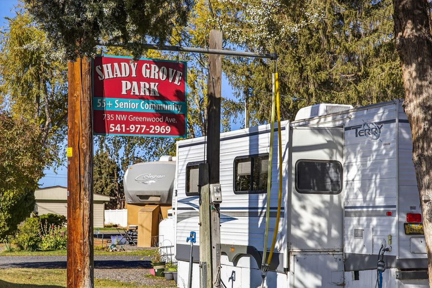 A RARE BUSINESS OPPORTUNITY FIND! Located in the heart of Downtown Redmond, Shady Grove Mobile Home Park is a community-oriented mobile home and RV park for those seeking a simplified lifestyle. The park is a 25 space, (18 homes, 7 RV spaces) 55-plus community that's situated in a quiet and peaceful, city block setting. All homes are tenant owned, offer off street parking availability with individual driveway parking, while these well-established dwellings are all placed on 1.52 tidy acres. Owners enjoy the ease of a minimal footprint while being conveniently located to all of the city's nearby public and commercial amenities for recreation. A small storage/maintenance building for management use and two coin-op laundry units are on site for community-wide use.