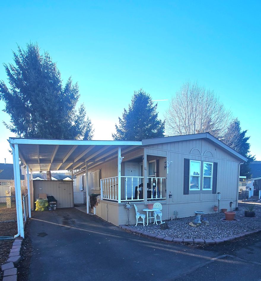 PRICE REDUCTION!! Located in Queens Garden Mobile Park, this 3 bed, 2 bath manufactured home is situated in a peaceful 55 and older community. Highlights include an open floor plan, enhancing spaciousness and comfort, and a breakfast bar for convenient dining. This home is perfect for anyone looking for a tranquil lifestyle in a welcoming environment.