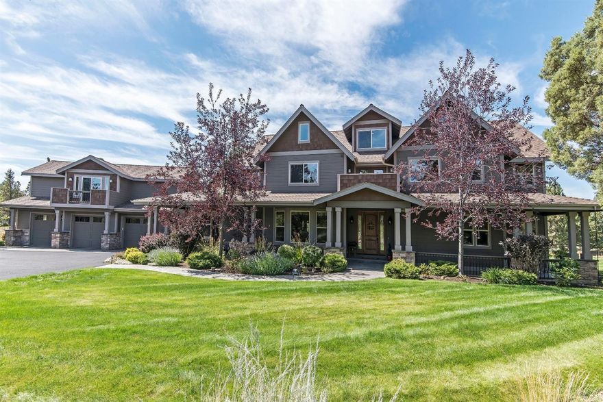 This beautiful custom home is a sanctuary in the country, yet close to town in desirable Overtree Ranch. The peaceful lawns & pond are watered with 1.25 ac of irrigation. Knotty alder trim, walnut wood floors, stamped concrete patios and beautiful wrought iron details highlight this unique property. Dine in the formal dining room or sunny breakfast nook. The master bedroom has a see-through fireplace shared with the master bath. The large soaking tub is light & bright, but affords superb privacy, and the tiled shower has 2 shower heads. There is a private deck off the master rear-facing the historic canal. There is an en-suite guest room. The expansive 3rd floor space is full of possibility w/ speakers, home theater wiring, plumbed for water, and limited mountain views. The detached 3-car extended length garage has a 2 bed/1 bath mother-in-law quarters above. This property has so many details, they can't all be mentioned. See amenities list in Attached Docs for more.