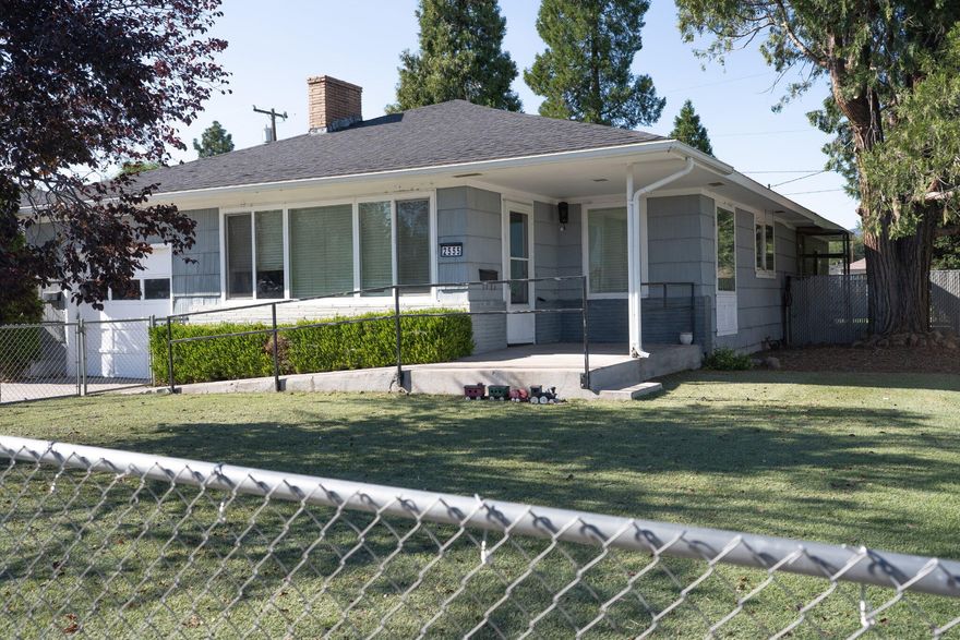 Well kept 2 bedroom, 2 bath home on a fenced corner lot with alley access. Home is ADA accessible. Ideal for first time home buyer, college student, or investor. Newer kitchen appliances, living/dining room windows, laminate floors, and garage door opener. There are ceiling fans in both bedrooms and living room. Backyard has a shed and wide gates that open to the alley for your RV. Front and back yards are turf for low maintenance. Close to shopping.