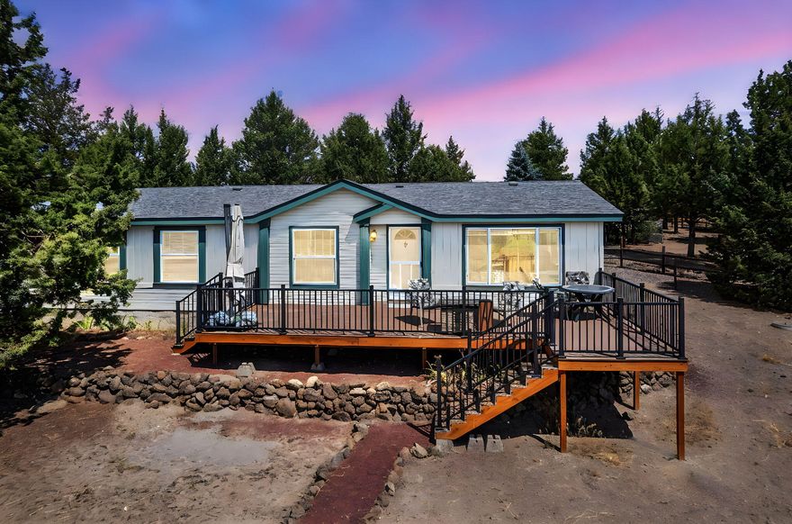 Welcome to your new oasis in Crooked River Ranch! This beautifully maintained home offers the perfect blend of comfort and natural beauty. Step outside to a serene meadow, directly behind your home, with a gorgeous mountain view backdrop. This peaceful open space offers a relaxing trail system with access directly from your backyard. The home boasts newer front and back decks, perfect for entertaining guests or unwind while soaking in the wonderful views. Whether you're enjoying a morning coffee or hosting a summer barbecue, these decks are sure to enhance your outdoor experience. Inside, you will be greeted by a spacious and inviting interior with a well-designed layout. The open living areas are bright and airy, creating a calming atmosphere. Located in the desirable Crooked River Ranch community, you'll benefit from a tranquil setting while still being close to local amenities and recreational opportunities.