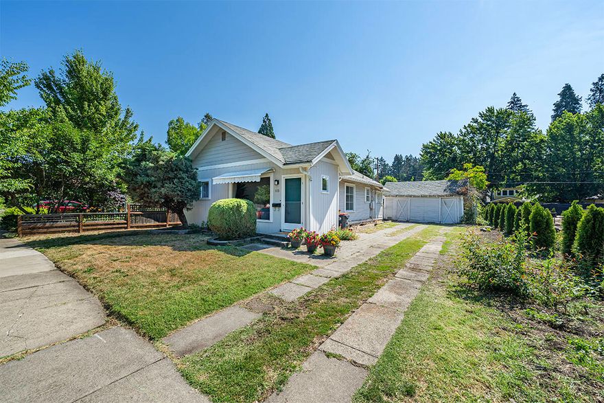 Sweet location in Old East Medford with easy access to shopping, hospitals, parks and schools. Adorable 2 bedroom, 1 one bath home located very close to downtown Medford. Bright living room features a huge picture window and beautiful solid wood oak floors. Thoughtful built-ins are featured in the inviting dining nook. Brazilian cherry floors in the hallway and extra bedroom. Travertine floors highlight the primary bedroom along with a good sized closet. Fenced back yard provides ample space for gardening and entertaining outdoors, with plenty of room left to build an additional dwelling unit (alley access, too!) New sewer line to street, recently refinished floors, blown-in insulation in attic. Just minutes from the Medford Farmer's Market, Medford Center shopping center, downtown Medford and Bear Creek Park.