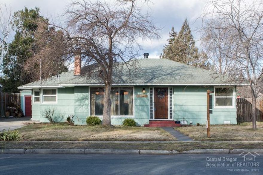 Classic cottage in the heart of Redmond, OR with close proximity to Downtown and the Dry Canyon Trail. This vintage home sits on a corner lot & exudes character with original hardwood flooring, built-ins, rounded arch ways and updated bathrooms. With in the spacious 1600+ sqft home you'll find 3 bedrooms & 1.5 baths with ample storage. Enjoy the backyard this summer under the shade sail pergola and in ground fire-pit. Call today for availability!
