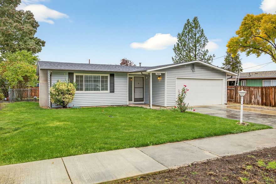 A charming single-story home in a great East Medford neighborhood. It boasts three good-sized bedrooms, two full bathrooms, and a large living room that is light and bright. The living room opens to the dining room and kitchen, and out onto the covered patio and large fully fenced backyard. It is perfect for BBQ's and entertaining. There is RV/Boat parking, a newer roof, and newer vinyl windows throughout. Move in ready!