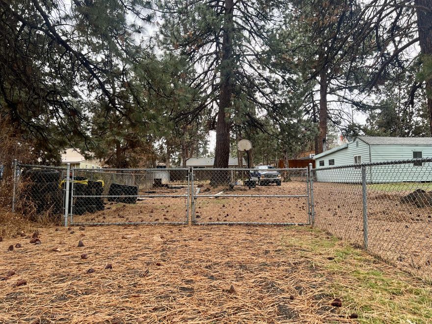 Rare flat .14 residential lot, with so much potential.
Ready to build an investment property or your dream home in Bend. A highly desirable & convenient location just around and within walking distance to many amenities such us the Old Mill District, Concerts, breweries,The box factory, Deschutes River, and many recreational activities. Mountain lovers! approx 31 miles to Mt. Batchelor! it is zoned RS, duplex, townhomes, triplex, ADUs allowed. Mountain Views a possibility from a second story home. Buyer to do all due diligence with the City regarding property development.