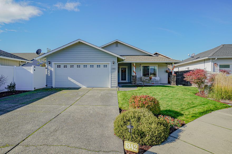 Move-in ready 3 BR, 2 Bath Chapman-built home in desirable Redwood area on very low traffic cul-de-sac. Fresh exterior and interior paint in June, 2019.  This home is spacious and inviting with its open floor plan and vaulted LR ceiling. Large kitchen with ample counter space and plentiful oak cabinetry also offers a snack bar adjacent to the full-size dining area and patio slider to the back yard.  Ceiling fans in large LR and roomy MBR. En suite Master Bath has an oversized walk-in shower with seating. Abundant closet space and a separate laundry room. Finished garage has built-in shelving and a workbench. Fully fenced back yard includes a small shed, and offers a covered porch off the DR, plus an additional patio for bbq'g and relaxing. In-ground irrigation front and back for easy lawn care. Long, wide driveway has room for your RV! All appliances included.