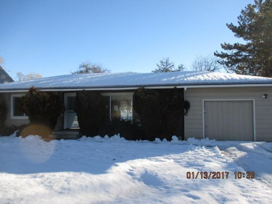 Large lot with a solid built Home! The home needs TLC, interior and exterior maintenance. There is an attached garage and good access to the back 40. Attractive floor plan - just needs your personal touch.