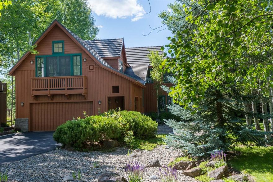 Enjoy Cascade Mtn. views & spectacular sunsets from this lovely lodge style free standing Osprey Pointe home in private gated Crosswater Community. Reverse living floorplan w/vaulted open beam ceiling & floor to ceiling stone gas frpl in living rm. gourmet kitchen w/granite tile counter tops, breakfast bar & sunny nook. Spacious upper level master suite w/sitting area, built-in desk, cabinets, & cozy gas fireplace. Two additional lower level master suites each w/gas fireplaces & small refrigerators in bathrooms have access to the back yard & private hot tub area. Beautifully landscaped w/low maintenance native plantings. Enjoy watching the wildlife from the upper deck w/stairs to the yard & new hot tub below. Lot backs to expansive common area providing a tranquil & private setting.