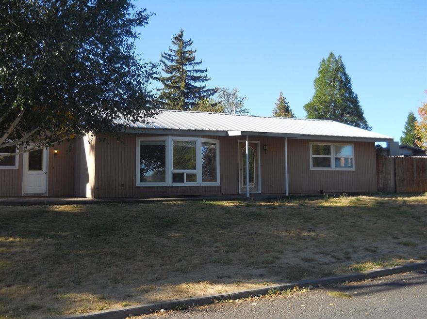 Here is a nice suburban home close to the airport and the little league fields! This home has a nice detached shop and fenced back yard and porch! The house sits on a large corner lot and has tons of potential! Don't let this one get away, come check it out!