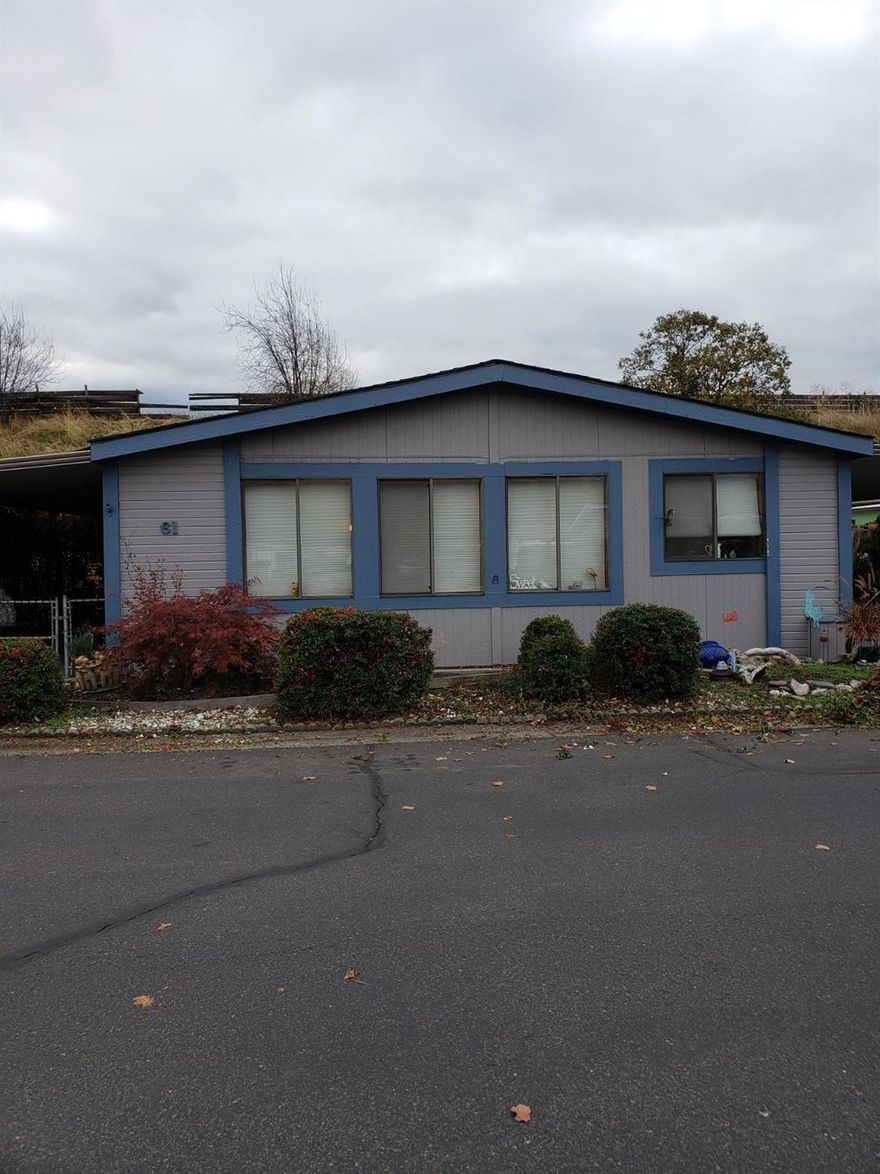 Very large manufactured home in desirable senior park. Just off Hwy 5 in Talent. Park amenities include: Pool, sauna, club house & dog run.