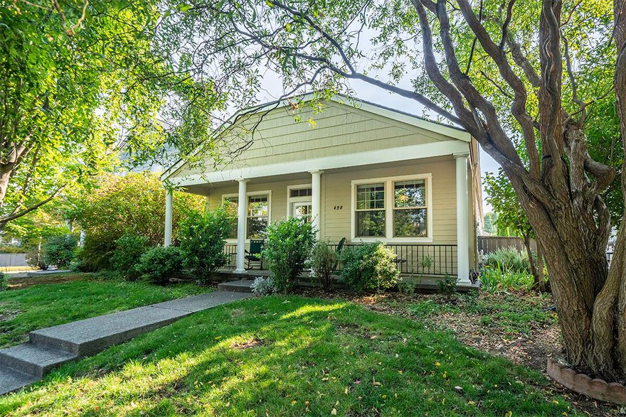 Wonderful home in highly desirable River Walk. Single level stylish contemporary Craftsman with inviting covered front porch. Engineered wood flooring in main living areas & crown molding add to the attractive & warm interior. Living room has gas fireplace & opens to the spacious & open kitchen with solid surface counters, abundance of cabinets & stainless appliances. The kitchen is open to the dining room with abundance of windows & light and accesses the rear fenced yard & patio. Lovely primary bedroom with upscale bathroom with dual sinks, wide tile flooring and shower with tile surround inlaid with mosaic pattern. Two additional bedrooms with additional bath. One of the bedrooms has French doors and is off the living room and makes a perfect office. Laundry room is spacious and has sink and cabinets and access the attached rear 2-car garage. One block to 40-acre nature park with creek side trails.  Carpet is wool and the newer interior wall paint is low VOC for sensitivities.