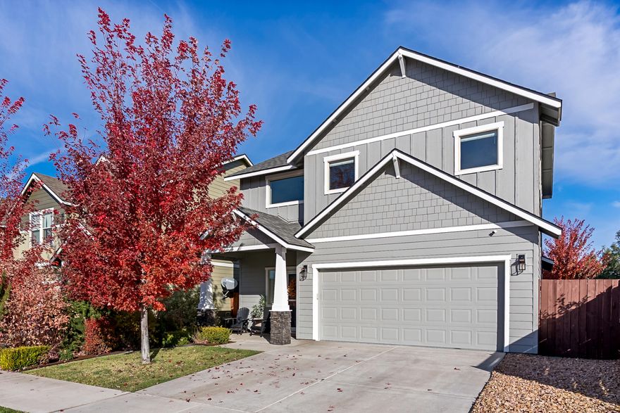 Meticulously maintained 3-bedroom, 2.5-bath property offering 1,840 sq ft of thoughtfully designed living space. The main-level primary suite provides convenient single-level living, while the open great room features a gas fireplace and connects to a gourmet kitchen with slab granite counters, designer backsplash, and stainless-steel appliances. Recent updates include exterior paint, epoxy-coated garage flooring, custom shelving, laundry cabinetry, and custom closets in the primary suite. Upstairs features a versatile loft ideal for relaxing, working, or entertaining. The fenced easement expands the backyard, and the patio offers inviting space for year-round enjoyment. Central air conditioning and modern finishes enhance comfort throughout. A completed pre-listing inspection gives buyers added peace of mind that it's move-in ready from day one. Ideally located near parks, shopping, and schools, it combines quality upgrades with everyday convenience in the heart of Bend.