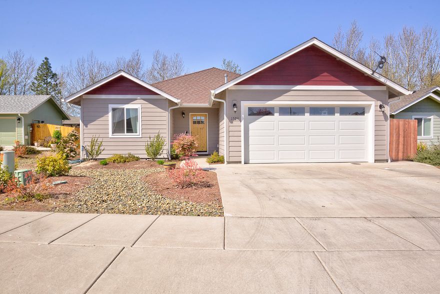 Beautiful newer home in a great area.  This 3 bedroom/2bath home features open concept kitchen with granite countertops, island, pantry, stainless steel appliances and a gas range for your favorite cook opening into a vaulted great room with sliding glass doors out onto the covered patio and nicely landscaped backyard.  Master suite with walk-in closets, double sinks in vanity and two more bedrooms complete this great package.