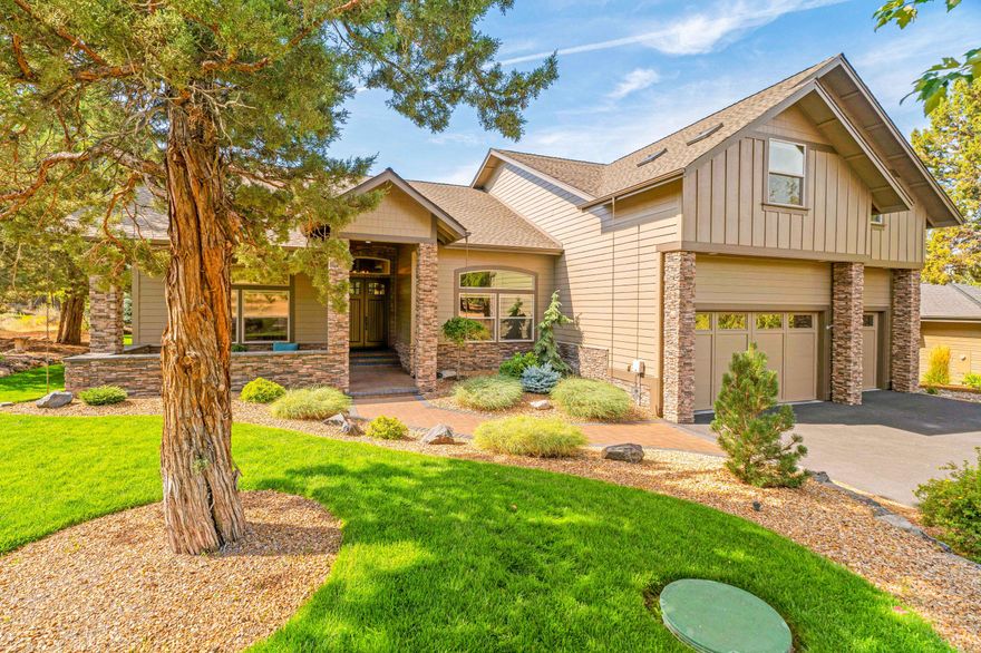 This gorgeous custom home is situated at the headwaters of Trail Creek in Eagle Crest Resort and has been beautifully updated with high-end luxury finishes throughout! The great room floor plan features soaring ceilings, walls of windows, new wood plank tile flooring, gas fireplace with stacked stone accents, built-ins and floating shelves. The kitchen boasts a breakfast bar, new solid quartz countertops, gas cooktop, stainless appliances, a built-in dry bar, china display and pantry. Primary suite with updated slab quartz countertops, new tiled walk-in shower, soaking tub, and walk-in closet. 
On the upper level you will find three guest rooms; one ensuite with a walk-in closet, a full bath, and a deck with views of the Cascade Mountains! Spacious laundry room with abundant storage, quartz countertops, and wine fridge. Front courtyard and paver patio overlooking the creek. Oversized triple-car garage with loft storage completes this amazing home!