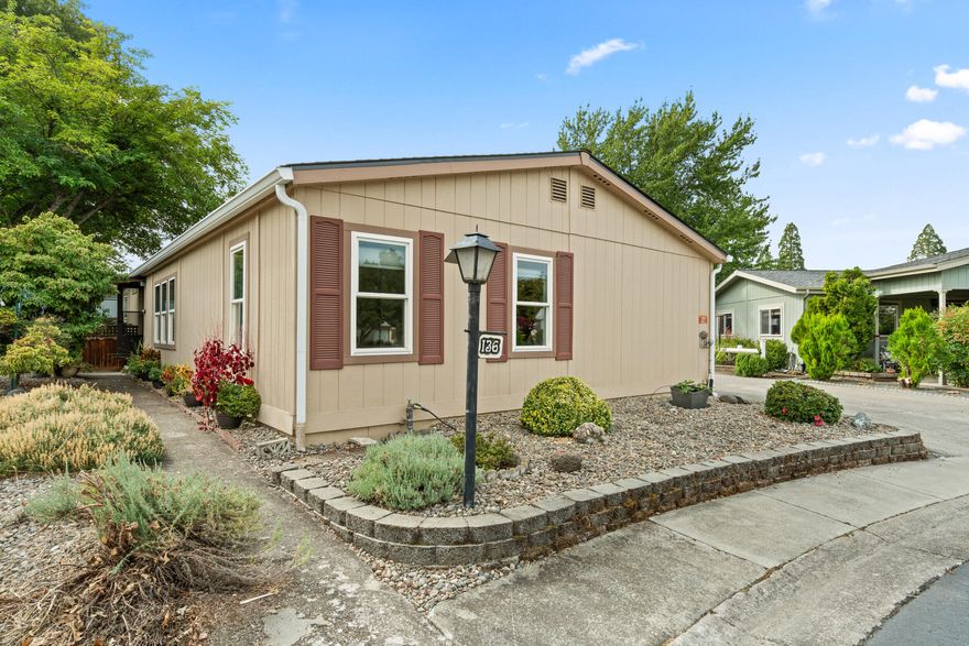 Rare opportunity in Central Point! This spacious 1,500+ sq ft home is one of the few manufactured homes on land in the park, located in a quiet cul-de-sac within the coveted Meadows 55+ community offering a pool, clubhouse, and planned activities. Lovingly cared for by the original owners, this property features numerous updates including a new roof, HVAC, stove, and water heater all within the past 3 years. Enjoy energy efficiency and comfort with SunSaver awnings, solar tubes, and honeycomb/cellular shades. The open, light-filled floor plan provides generous living space perfect for entertaining or relaxing. Pride of ownership shines throughout, making this home truly move-in ready.