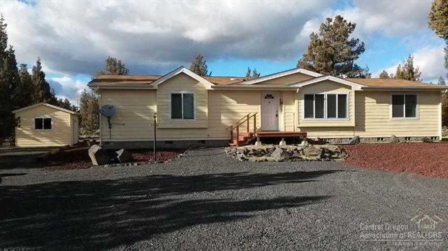 Extremely well designed 3 bed, 2 bath home located south of Prineville close to Prineville Reservoir on 1.8 acres. This home features an open floor plan with skylight tubes in the large kitchen area offering additional light that makes it great for family functions. Home was designed with large bedrooms, each having large walk-in closets. There is also a large bonus/theater room. Home has its own well and has a small outbuilding completely wired and could be used for storage or hobbies. Very nice set up.