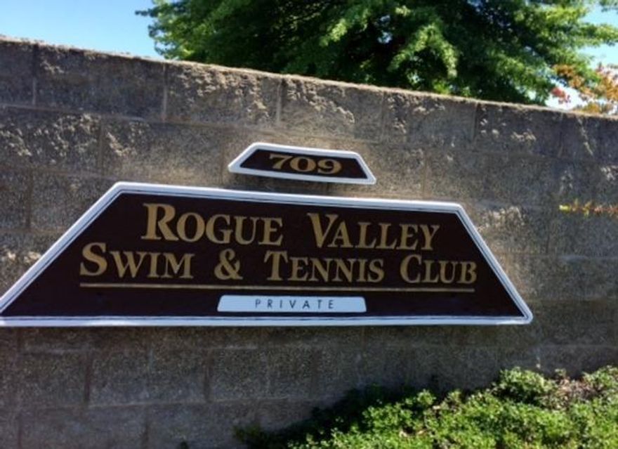 Opportunity to purchase the well established Rogue Valley Swim & Tennis Club in the heart of Medford's East side residential growth area. Located along N. Phoenix Rd. with access from I-5 via Exit #27 or Exit #24. The purchase price includes all personal property and the potential to keep the current membership revenue stream, if the Buyer so desires. This is not a business sale. The facility includes 5 indoor tennis courts, work out area, private offices, viewing area, men's and women's locker rooms each containing spa and sauna rooms. Additionally, there are outdoor courts (3) plus an outdoor pool with an adjacent pool house. The main structure has fire sprinklers and there are 50 on-site parking spaces. The facility is operating under a Conditional Use Permit. Property being sold AS IS condition. Currently lighting is being retro fitted with LED lighting. Listing agent related to seller.