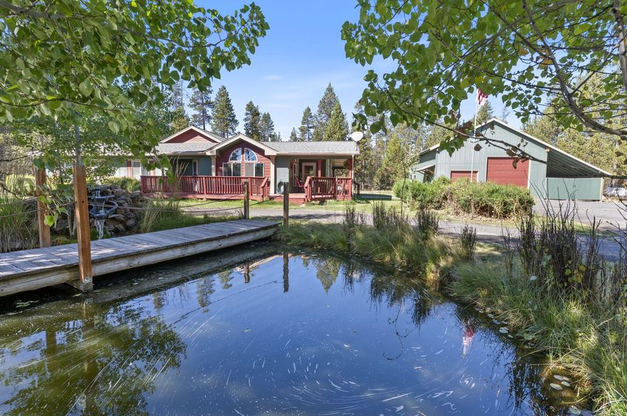 This beautifully maintained property sits on over 2 acres and offers it all! The spacious main home features new LVP flooring, new toilets, a water softener, and charming touches throughout. The main house is 3 bedrooms with 2 bathrooms. Also included: a fully equipped 1 bedroom and 1 bathroom ADU with kitchen and large flex space—perfect for guests or rental income. The property includes a true workshop boasting a 1200 pole barn/shop with a 3000 amp heater and an AC unit. Tons of extras include: a storage container, tractor, riding lawn mower, 5th wheel RV, dump trailer, wood splitter, two freezers, and even a horseshoe pit and tree fort! Enjoy stunning landscaping with old-growth trees and room to roam. This is turnkey country living with all the bells and whistles—literally.