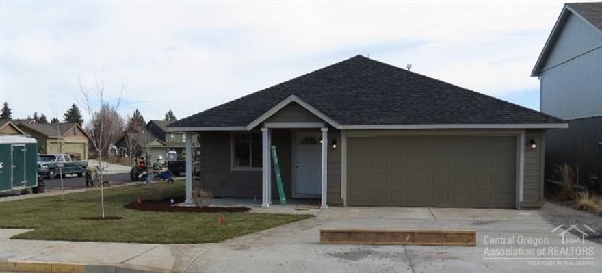 This brand new single level home is located in SW Redmond's neighborhood of Julina Park. Featuring 3 beds, 2 baths & a den, this floor plan is great. The interior features a den/4th bedroom w/French doors, laundry room, kitchen w/large island eating bar that is open to the dining area & a great room. The kitchen offers ample counter/cabinet space, a pantry & SS appliances. The bedrooms are spacious & the master suite boasts vaulted ceilings, dual closets & dual sinks. Front yard landscaping w/sprinklers.