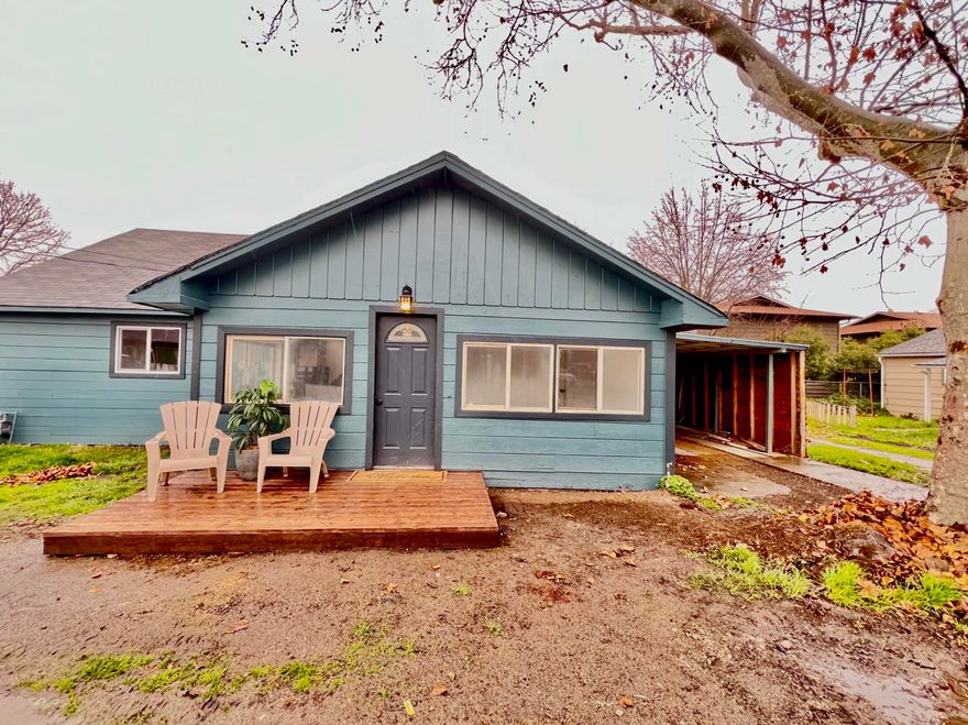 Great investment opportunity! 2 homes (zoned  high density MFR-30) on one lot in Medford. The larger home is 2 bedroom and 1 bath with a 2-car garage and carport. The full bathroom has been completely remodeled and the kitchen has new vinyl flooring. The small house is a 1 bedroom and 1 bathroom standalone home.