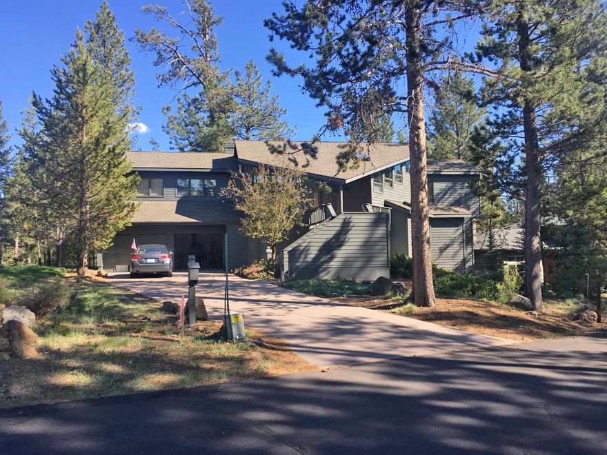 Great location on the Woodlands Golf Course in Sunriver. Enter the home into the great room w/ vaulted wood ceilings, floor to ceiling rock fireplace, built in entertainment center with granite top, a wall of windows looking out over the large deck to the common ground and golf course.  Your feet will stay warm with the heater bathroom and kitchen floors! This home has been very well cared for. Newer items - interior/ exterior paint, wood/tile/ stone flooring, gas fireplace, insta-hot & kitchen faucet, gas range and microwave. Back upper deck was rebuilt and decorative wrought iron railing was added. Large office off of master suite plus enjoy extra room in the recently updated 300 sq.ft. bonus room bringing the sq.ft of the home to over 3300 sq.ft.  Features A/C and hot tub with new control panel and pump. You will not be disappointed in this home. Great Vacation Rental