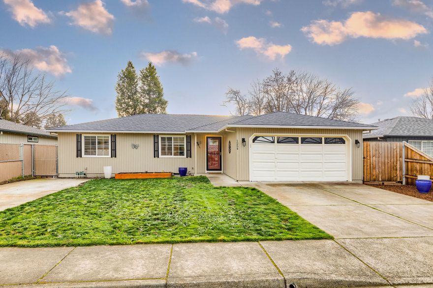 Welcome to this beautifully maintained 3 bedroom, 2 bath home.  Lots of updates have been done in the last year and a half:  outside paint, roof, backyard cement pad with gazebo, new deck, kitchen counters, flooring throughout and so much more.  Open living area that looks to inviting backyard, a great place to escape.  RV parking on cement slab.