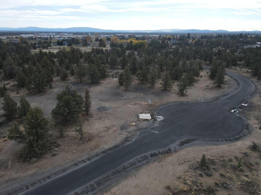 Exceptional opportunity to own nearly 10 acres in Bend's new luxury development, Eastbourne. Located just outside city limits, this flat, premium homesite offers privacy,
space, and convenience—minutes from the airport, St. Charles Medical Center, and downtown Bend. A rare blend of open landscape, potential mountain views, and estate
living near top amenities. Ideal for medical professionals and discerning buyers seeking a peaceful retreat with quick access to work, recreation, and world-class
healthcare. Build your dream residence in one of Central Oregon's most promising new addresses. Standard Septic Approved. Avion Water, TDS Fiber and Central Elec
services at Property Line. Private Mailbox statIon with surveillance for security.