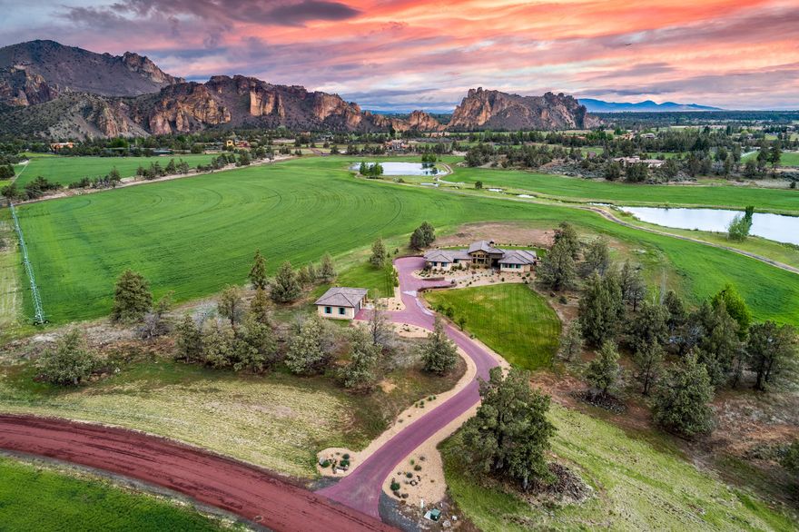 Located at the base of the renowned Smith Rock in the community of Ranch at the Canyons where luxury ranch life embraces tranquility & solitude. The Peninsula welcomes you! Sited on 4.5 acres, this exquisite luxury home features single floor living with 2 en-suites and a Master bedroom with stunning bathroom including soaking tub. Home also features a den/study also capturing breathtaking views of Smith Rock. 3 car finished garage, additional detached 2 car garage with office or guest room and separate bathroom. Become immersed in the peacefulness of this Tuscan ranch community.