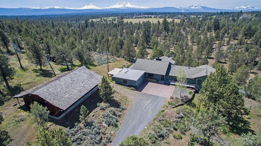 75 Acre Estate! One of a kind large tract with superior mountain views and superior privacy! Watch soaring eagles, mule deer, and a host of other wildlife from this older custom home nestled on Fryrear Butte. Home features classic vaulted ceilings, lots of windows, and lots of potential! Dramatically reduced price to allow for new owner updates and remodeling.
