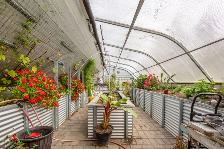 Start your New Year right with a new home: featuring a state-of-the-art geothermal 'greenhouse in the snow', offering yr-round growing, just in time for your January planting. Explore this property set on a .94 acre, fully fenced & gated, 2018-built home offering 1,883 sq ft, 3 bedrooms, and 2 baths w/ Lg covered deck. Open living, A/C, Gas Fireplace, granite and tile accents. The partially underground 17x52 greenhouse w/geothermal automatic heating and cooling system for ventilation, cultivate a wide variety of plants, regardless of the climate plus a cold room. Heated 25x30 Shop w loft & covered parking plus 30-amp RV Hookup. 45x20 Garden, metal roof, a hot tub, 2 designer paver patios, 1 plumbed for gas firepit plus a flagstone landscaped fishpond. This complete lifestyle package, combining modern with a functional, ready-to-grow estate in beautiful Central Oregon's playground. 1 yr home warranty. $5000 Buyers closing credit/buydown offer with Mason-MacDuffie Mortgage Debbie Weddle