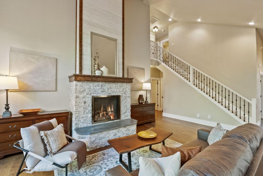 Located in Timber Creek, this home was taken to the studs in 2019 and redesigned with timeless quality upgrades. The kitchen shines with Café appliances, white cabinetry, quartz slab counters, a farmhouse sink, and subway tile backsplash, paired with a commercial Maytag washer/dryer. Mill run white oak floors lead to the great room, where floor-to-ceiling windows and a Mendota propane fireplace create light and warmth. The main level features an office and a spacious primary suite, complete with a soaking tub, dual sinks, a walk-in shower, a walk-in closet, and new LVP flooring. Upstairs, two bedrooms and a full bath provide privacy for family or guests. Enjoy a covered patio off the dining room and a 2-car extended garage with tandem 3rd bay for storage, workshop, or motorcycle parking. All within walking distance to Whychus Creek, Sisters Elementary, downtown Sisters, and just 0.3 miles to the new Sisters Community Recreation Center.