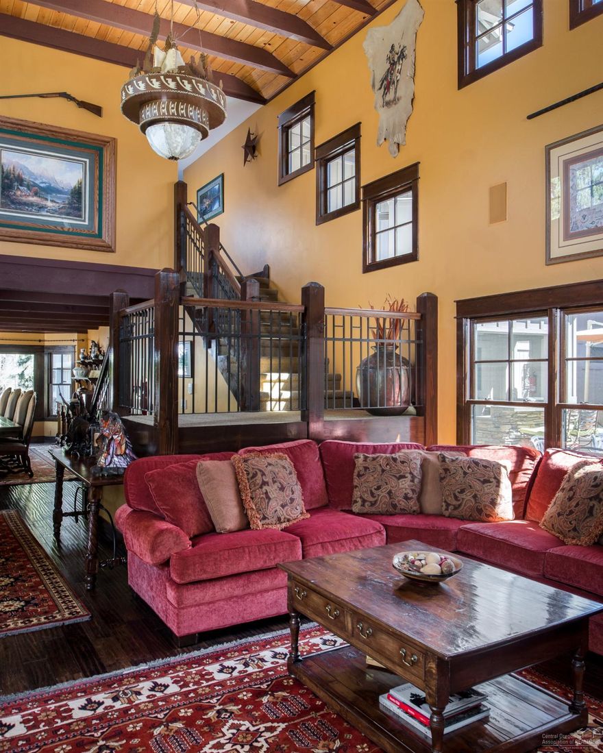 If entertaining & family gatherings is your lifestyle, this home is IT! A one of a kind layout in Sunriver on a 0.48 acre lot in a quiet area. Remodeled in 2005, featuring 8 bdrms + den, 6 baths, FR/media room, breathtaking LR w/ stacked stone FP (one of 4 FP in the home). Indoor 16' x 32' heated pool, sauna, hot tub, enclosed courtyard in the center for private BBQ & outdoor entertaining. 3 car garage + heated bay for shop/hobby area, A/C, custom finishes throughout. SHARC paid! This is a MUST SEE!