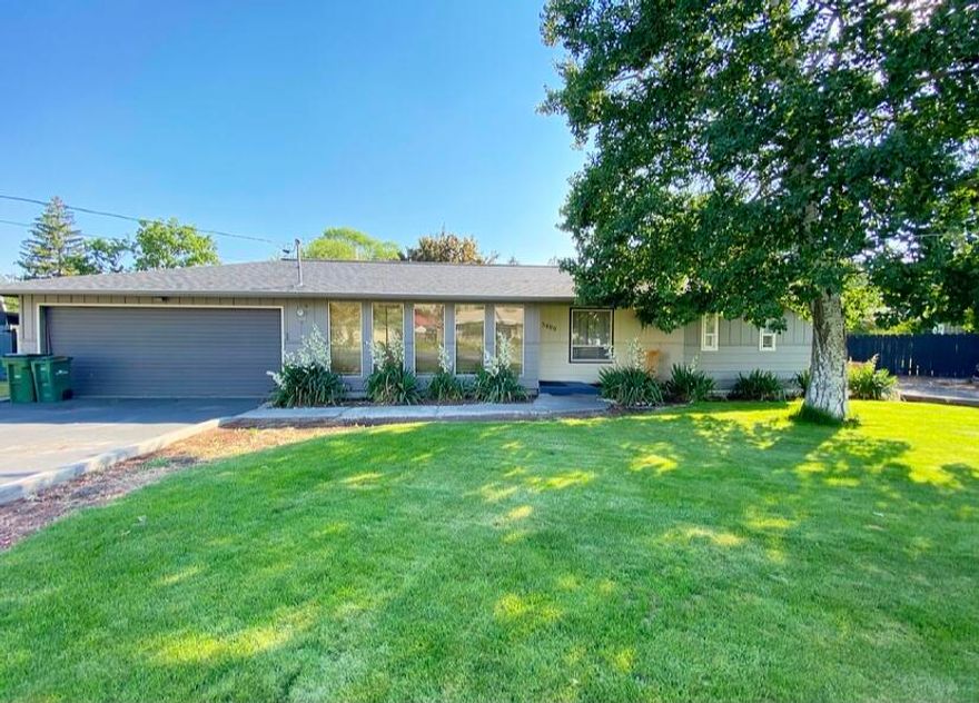 Here is a wonderful three bed two bath home in the south suburbs! This lovely home has a very large backyard with a hot tub and shed, up front has tons of RV parking and a two car garage! This house has newer updated flooring and tiled showers in both  bathrooms and a wonderful galley kitchen, this  home is ready four you, come take a look today!