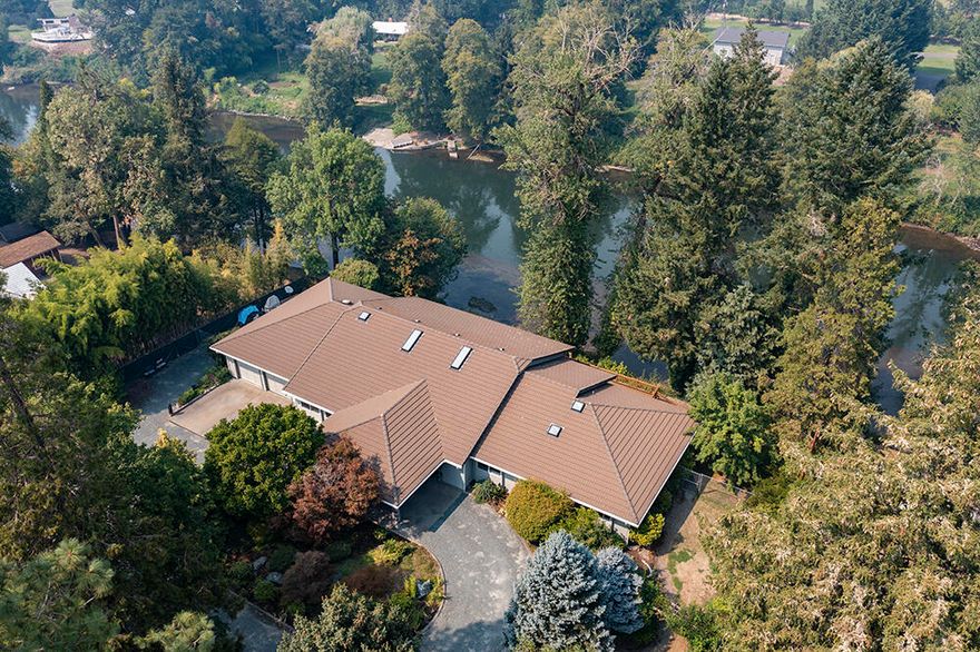 Outstanding Riverfront property on the Eisman Stillwater. This beautiful home was built in 1992 and features 3 bedrooms, 2.5 baths, and approx. 3304 sf., office, great room with extensive windows for incredible river views and an abundance of natural light, vaulted ceilings, formal dining room overlooking the river, dream kitchen with slate floors, two refrigerators (1 Sub Zero), a cook top, double ovens, warming drawer, slab granite counters and crisp white cabinets, skylights, primary room has views of river and a luxurious bath with soaking tub and cultured marble shower, walk in closet, guest room share a Jack and Jill bath set up. Enjoy the river even more with 2 decks one is covered and can easily be screened. On the outside there's an approx. 2000 sf shop with finished room with a bath. Large water feature has waterfall, irrigated pasture, multiple full RV hook ups, fruit trees, security gate, Porte cochere entry, circle drive, steps to the river, and the list just keeps going.