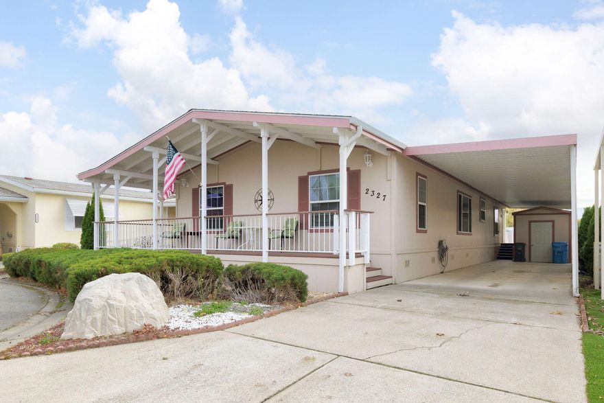 Beautiful home in Willow Estates Mobile Home Community. This 1728 SqFt, split floor plan home has a spacious kitchen with built in island and eating bar. The dining area has space for both formal and informal dining. The  primary on-suite bedroom has a huge closet, double vanity, soaking tub and easy step shower. The wraparound deck is perfect for enjoying your morning coffee or hangout with friends in the evening. Seller is including in the sale, at no charge to the buyer- the fireplace and 65'' TV in living room, washer-dryer, barstools, dining table, mirrors and decorative pictures throughout the house as well as drapes can all stay if preferred.  The home is placed on a quiet cul-de-sac with a storage shed and covered carport. Willow Estates Mobile Home Community is a 55 and over park. All occupants must be at least 55 years old. The park does allow one pet. Park rent is $650, park approval is required (easy process.)