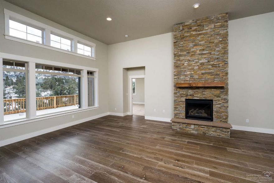 Brand New Construction, 2038 SF, 3 Bedrooms, 2 Baths, backs to Common Space! Hardwood Floors, Country Kitchen with Slab Countertops, Large Walk-In Pantry, Nice sized Laundry Room adjacent to Two Car Garage, Amazing Deck off the Great Room and Master, Beautifully Tiled Master Bath, Large Walk-In Closet. All this and the Great Amenities At Eagle Crest, Three Golf Courses, Three Athletic Centers, Restaurants, Walking and Biking Trails throughout and Horse Back Riding!