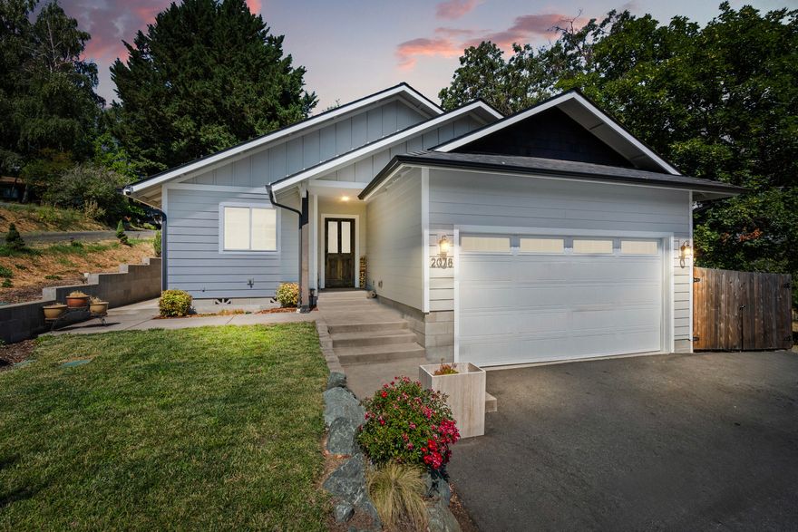 Stunning Move-In Ready Home - 2078 Cloverlawn Dr, Grants Pass
This beautifully maintained single-level 3 bed, 2 bath home offers 1,320 sq ft of comfort on an oversized, fully fenced 0.28-acre lot. Built in 2020, it features an open layout with vaulted ceilings, large windows, and abundant natural light. The spacious kitchen flows into the dining and living areas—perfect for everyday living or entertaining. Enjoy mountain views from the backyard with plenty of space for gardening or relaxing. The large garage boasts high ceilings—ideal for storage, a workshop, or toys. Located in a desirable, well-kept neighborhood close to shopping, restaurants, and medical facilities, this home blends convenience, tranquility, and charm. Possible ADU potential—buyer to do their own due diligence. Whether you're a first-time buyer, downsizing, or investing, this bright and cheerful home checks all the boxes. Truly move-in ready—don't miss your chance to make it your own!