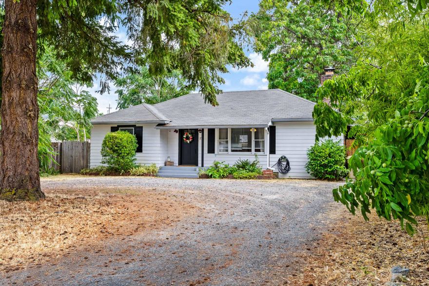 Experience the perfect blend of comfort and charm. This inviting home seamlessly combines modern style with exceptional convenience. Featuring a meticulously maintained exterior with inviting curb appeal, this home is a true gem. The spacious front yard boasts a circular driveway with lots of space for parking. Inside, you'll find a large living room with a cozy fireplace, creating a warm and welcoming atmosphere perfect for relaxation and entertaining. The well-designed kitchen features modern appliances and ample counter space, catering to all your culinary needs.Tasteful updates throughout add a fresh and modern touch to the home. The cozy bedrooms provide a peaceful retreat, while the fully remodeled bathroom includes a new tile shower and vanity, offering both style and functionality. Outside, the freshly landscaped backyard is perfect for entertaining, complete with a new fence for added privacy. The carport adds extra convenience for parking and storage. This is a must see!